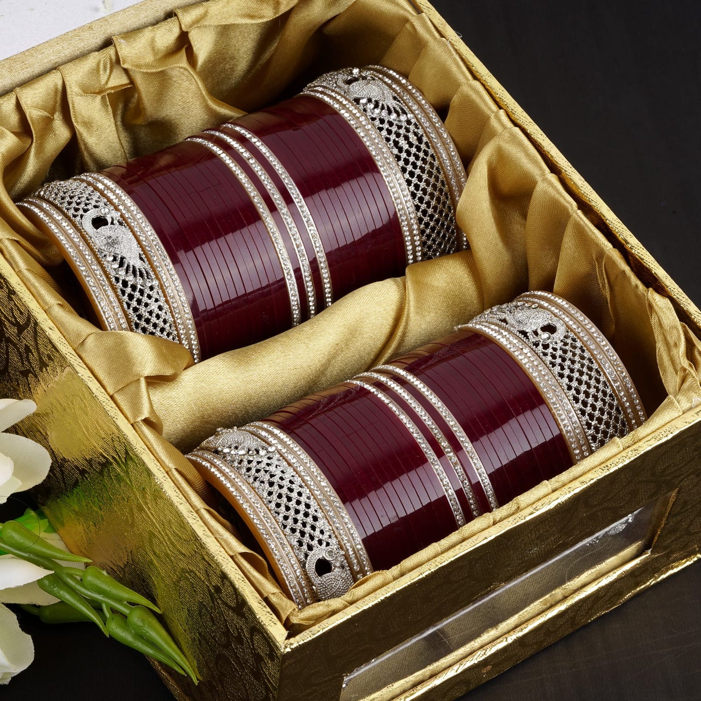 Stylish Bangles for bride with AD tuned Peacock shape