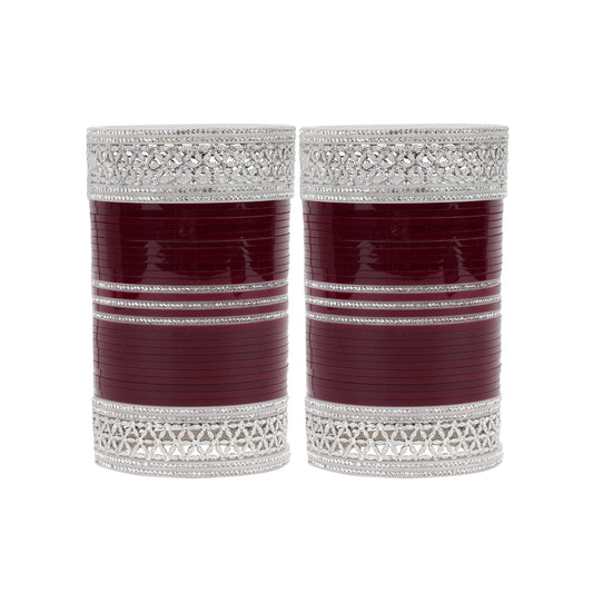 Red bridal chura set with silver kada detailing